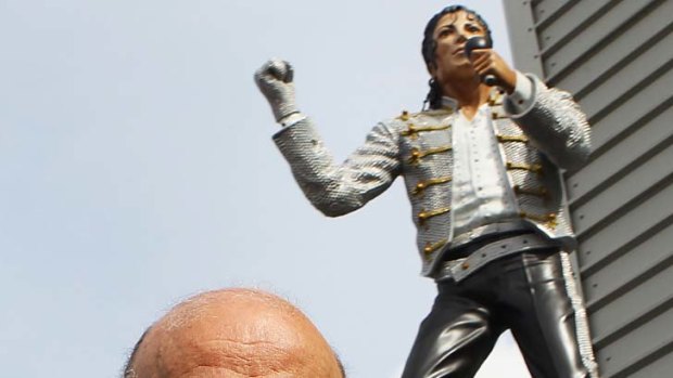 Controversial statue ... Mohamed Al Fayed unveils his tribute to Michael Jackson.