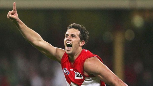 Nick Davis celebrates after kicking the winning goal in the semi-final against Geelong in 2005.