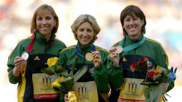 Australia's Krishna Stanton, Kerryn McCann and Jackie Gallagher hold their medals after winning gold, silver and bronze in the Women's Marathon Final in the 2002 Commonwealth Games in Manchester.