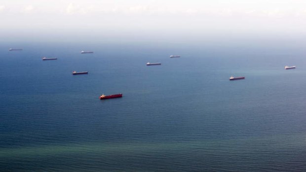 Coal ships in waters off the Great Barrier Reef.
