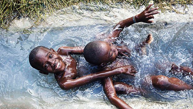Bath time ... two boys in their Port-au-Prince camp.