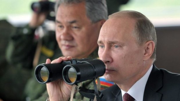 Flexing military muscle: Russian President Vladimir Putin.