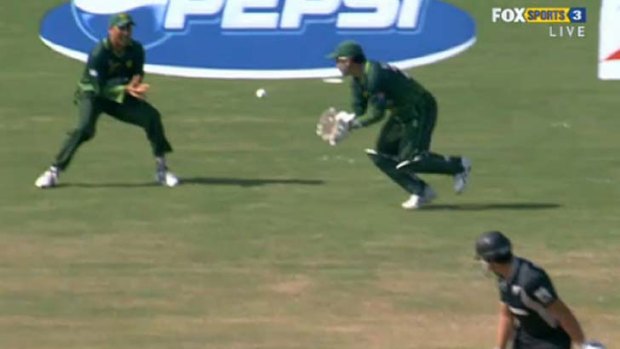 'Calamity' Kamran's costly mistakes ... Pakistan keeper Kamran Akmal lets a chance from New Zealand batsman Ross Taylor fly to the boundary between himself and first slip when the Kiwi, who went on to make 131, had yet to score.