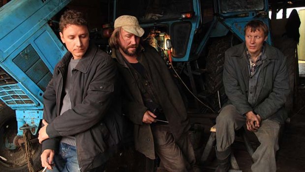 Famers' fight: Sasha (Alexander Yatsenko, left) joins his workers to save their livelihood.