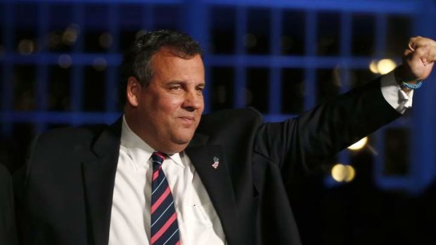Republican New Jersey Governor Chris Christie waves to supporters at his election night party in Asbury Park, New Jersey.