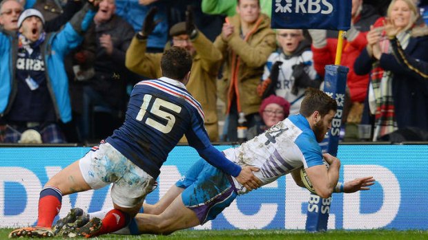 Tommy Seymour crashes over in the corner for Scotland.