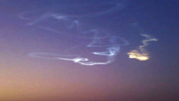 An image taken by on a mobile phone camera of the contrail left by the asteroid 2008 TC3 during its decent.