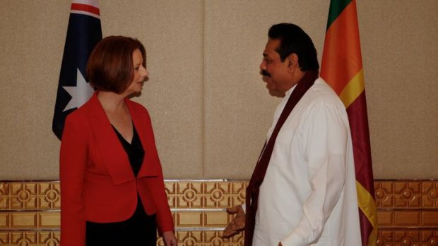 Julia Gillard meeting Sri Lanka's President, Mahinda Rajapaksa, in Perth yesterday.