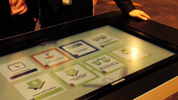 An interactive table, which bankers and customers will use to look at products such as home loans.