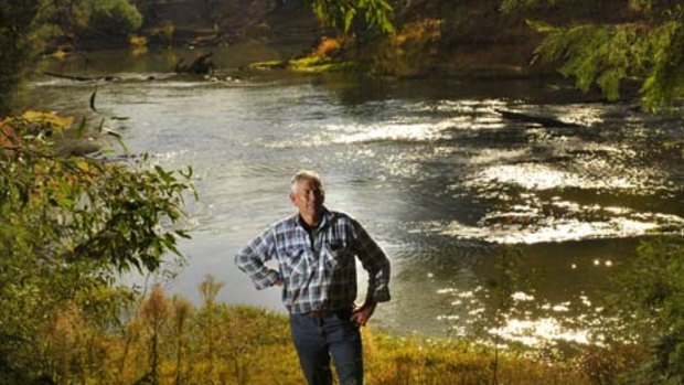 Farmer Russell Pell on a bank of the Goulburn River within his farm, which he has decided to keep stock off for environmental reasons.