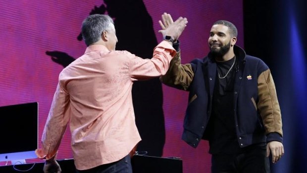 Drake, right, who will host a show, with Eddy Cue, an Apple executive, at the Apple Music introduction.