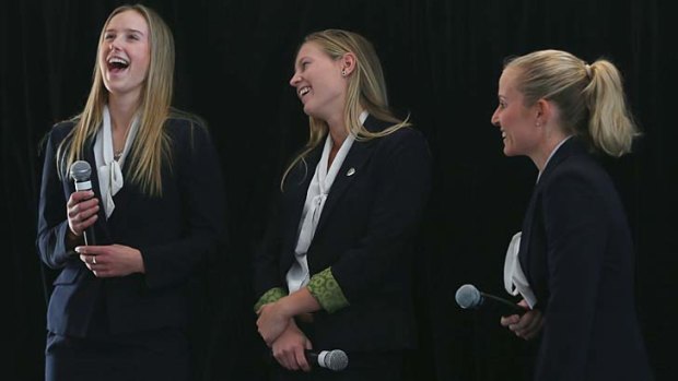 Ellyse Perry, Meg Lanning and Jodie Fields share a laugh on stage during the Southern Stars Ashes squad announcement at the SCG on Tuesday.