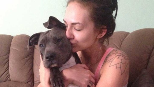 Serena the dog, reunited with owner Tiana Lehmann.