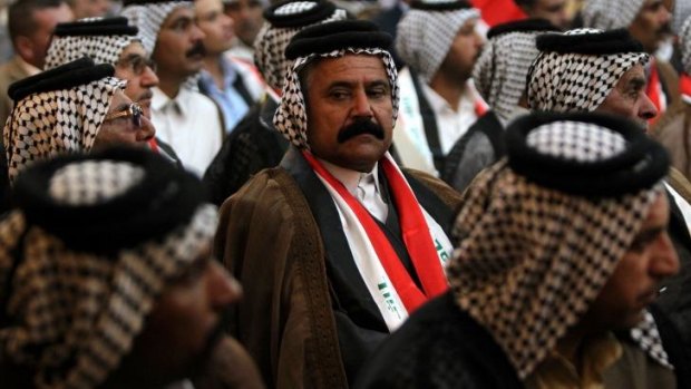 Iraqi tribal leaders attend a conference aimed at obtaining more decisive military action against IS.