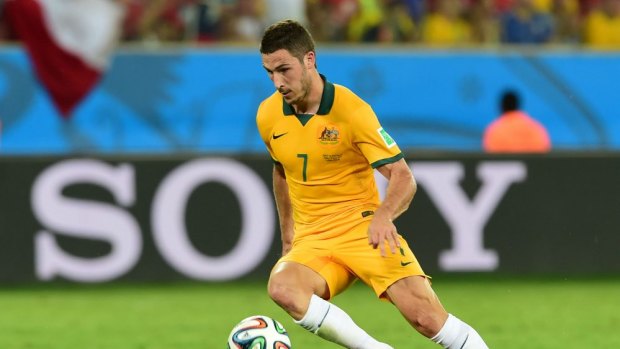 Great performances ... Australia's forward Mathew Leckie controls the ball during the match against Chile.