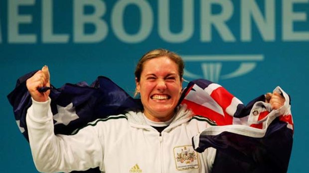 Deborah Acason of Australia celebrates winning the gold medal in Melbourne.