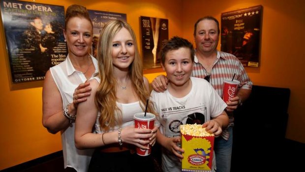 Brian and Marg Larkin with their children Courtney and Connor at the Nova cinema in Carlton.