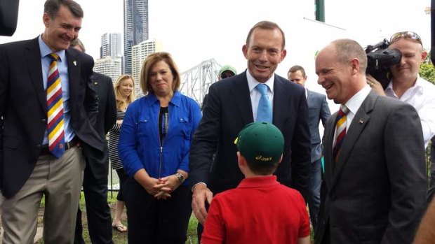 Prime Minister Tony Abbott with Lord Mayor Graham Quirk and Premier Campbell Newman in Brisbane, accepting the city's status as official G20 venue.