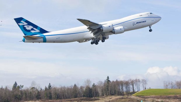 A Boeing 747-8 makes its first test flight in Everett, Washington. The 747-8 is the largest jumbo jet Boeing has built.