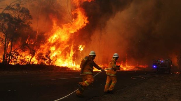 A Rural Fire Service brigade abandons a truck during a burn at Londonerry.