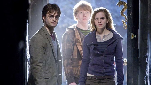 Daniel Radcliff, Rupert Grint and Emma Watson in a scene from "Harry Potter and the Deathly Hallows".