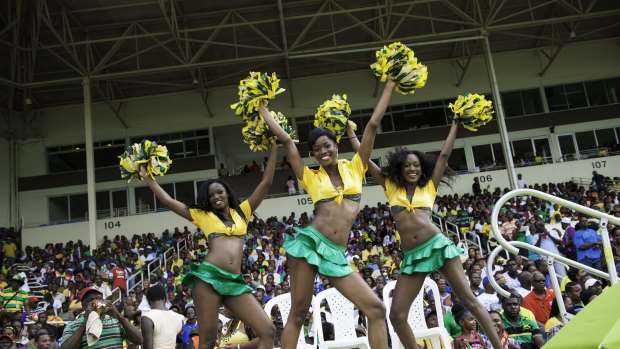 Cheerleaders cheer their team during the Twenty first Match of the Cricket Caribbean Premier League.