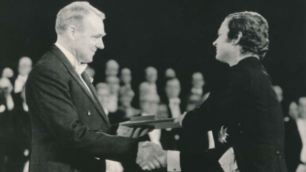 Big moment: John Cornforth receives the Nobel prize for chemistry from King Carl XVI Gustav.