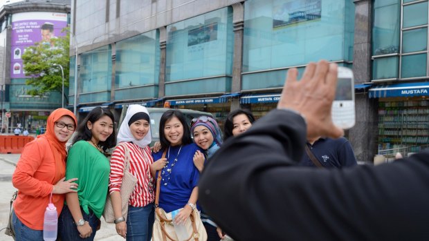 Muslim tourists visit Singapore's Little India.
