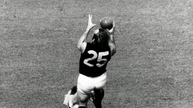 Iconic: Alex Jesaulenko takes the mark that will live forever in the 1970 grand final. 