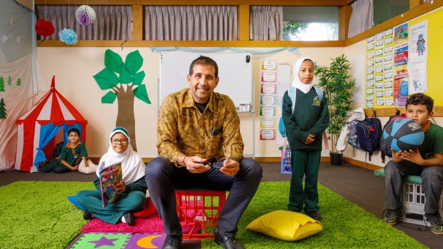 Islamic School of Canberra principal David Johns, centre, with year four students Luay Asfour, Latifa Albeaijan, Sarah Almugairn, and Alhaitham Al-Asfi. 