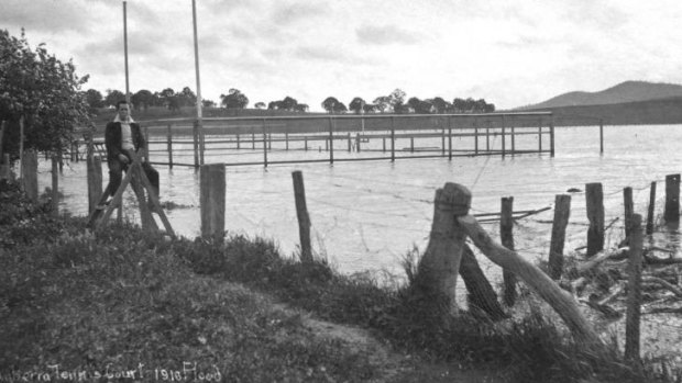 Water, water everywhere: Tennis courts in flood below Bachelors Quarters (on the Acton flats) in 1916.