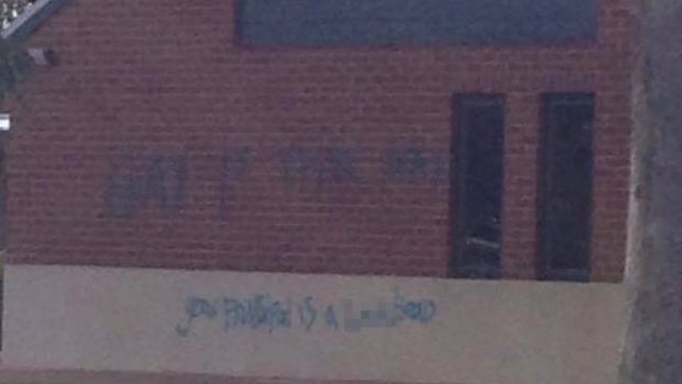 Graffiti spray-painted on the walls of Foundation Christian College in Mandurah.