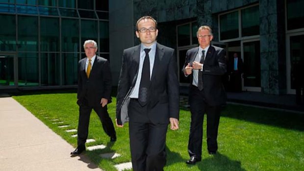 Andrew Wilkie, left, Adam Bandt and Tony Crook.