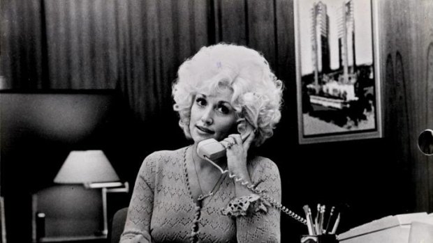 Dolly Parton in a scene from the movie Nine To Five 1986 PIC - FAIRFAX FILE