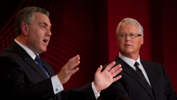 Mixed reception ... Treasurer Joe Hockey (left) answers questions from the public about the Federal Budget during the live broadcast of Q&A hosted by Tony Jones (right) at Penrith Panthers Leagues Club. 