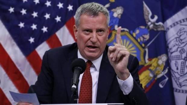 Calming nerves ... Mayor Bill de Blasio of New York City speaks about Dr Craig Spencer, who had returned to New York City from Guinea where he was treating Ebola patients.