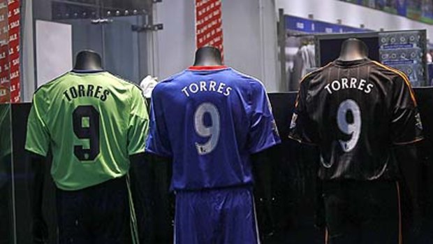 Drawcard ... Torres shirts in the Chelsea store.