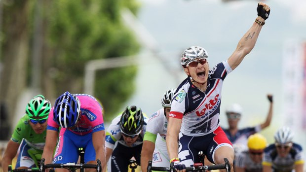 Andre Greipel of Germany and Lotto-Belisol Team celebrates winning stage four of the 2012 Tour de France from Abbeville to Rouen.