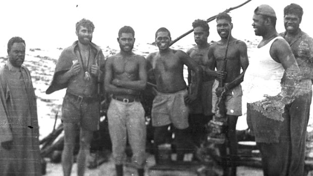 Fomenko with Aborigines who came to his aid after he tried rowing to New Guinea.