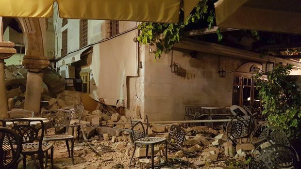 A cafe setting is littered with rubble following a strong earthquake on the Greek island of Kos early on Friday.