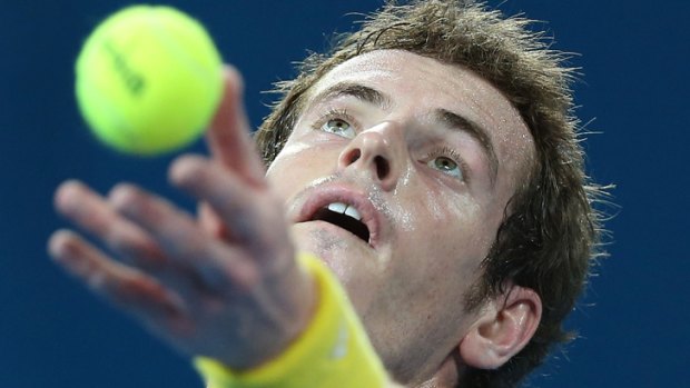 Andy Murray of Great Britain serves during his match against John Millman of Australia on day five of the Brisbane International.
