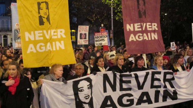 Outrage ... protesters in Dublin calling for abortion rights last month carry pictures of Savita Halappanavar.