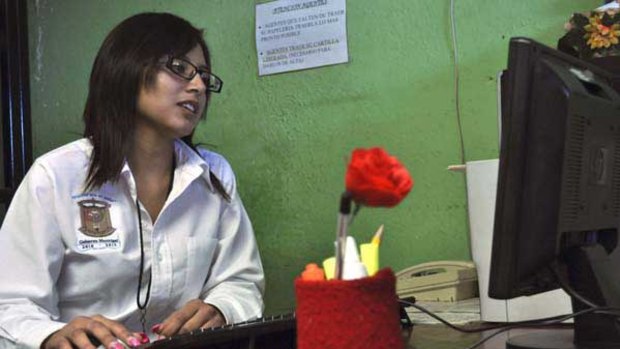 Praxedis' new police chief, Marisol Valles Garcia, 20, at her desk.