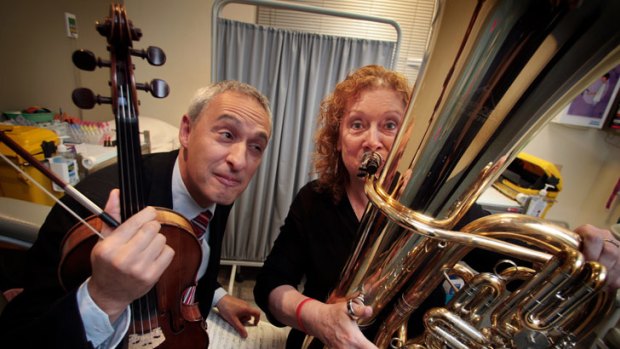 In tune: Tuba player Susan Bradley, who has had her left lung removed, will play a solo with the Royal Melbourne Hospital's Corpus Medicorum orchestra, and Dr Phillip Antippa, left. Picture: Angela Wylie