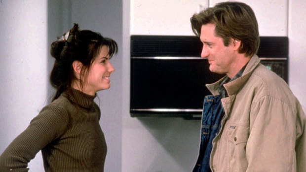 Sandra Bullock stars with Bill Pullman in <i>While You Were Sleeping</I>.