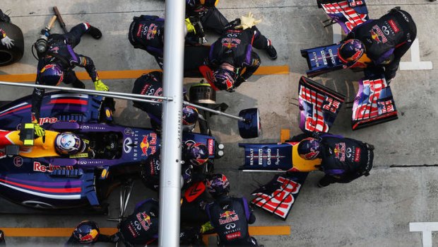 Pit stop: Daniel Ricciardo has his front nose changed during the Malaysia Formula One Grand Prix.
