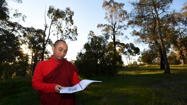 Venerable Ashin Moonieinda at 
the site of the proposed  centre.