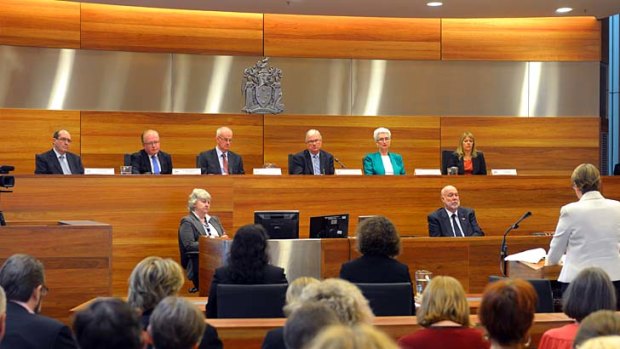 Frank and forthright: Justice Peter McCellan (top row, third from right) opens the royal commission on child sex abuse, promising it  will be as transparent and public as possible.