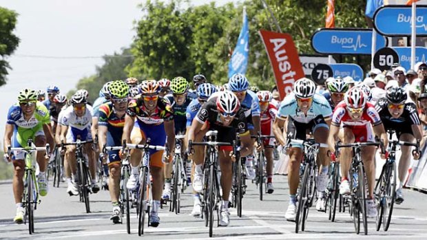 Close call: Oscar Freire (centre) narrowly wins yesterday's fourth stage of the Tour Down Under.