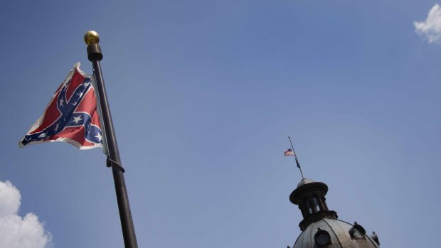 The Confederate flag flying in the South Carolina state house grounds on Wednesday. 